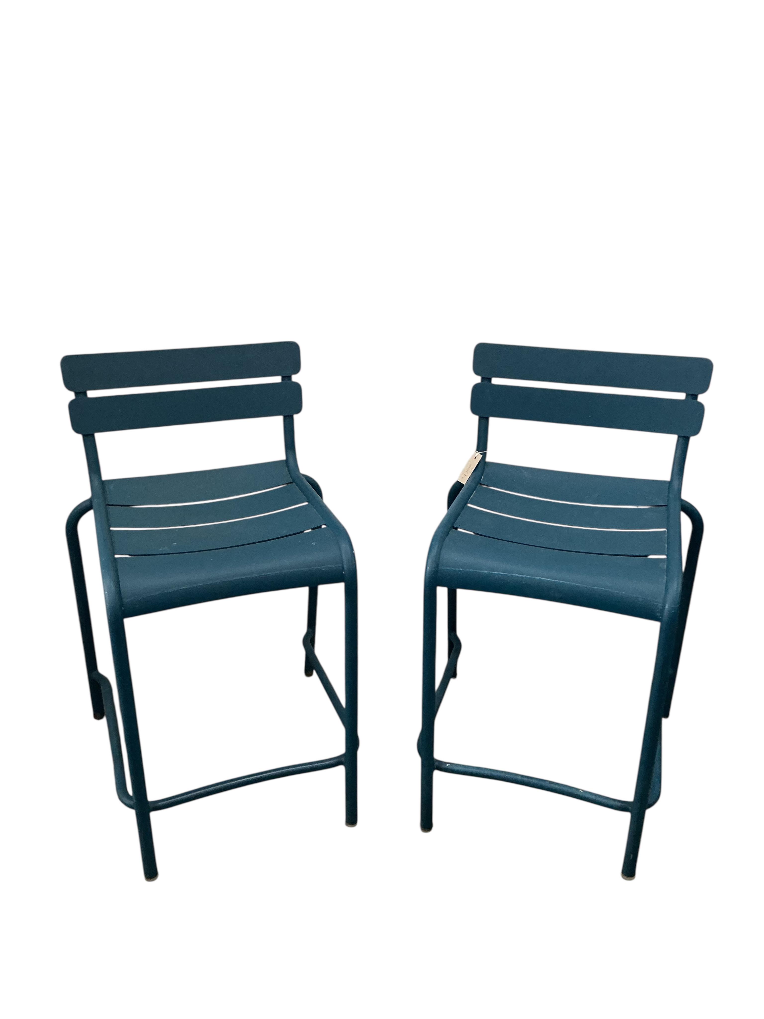 A set of five Fermob blue metal stacking chairs, width 45cm, depth 45cm, height 86cm